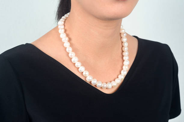 How to wear pearls with a black dress