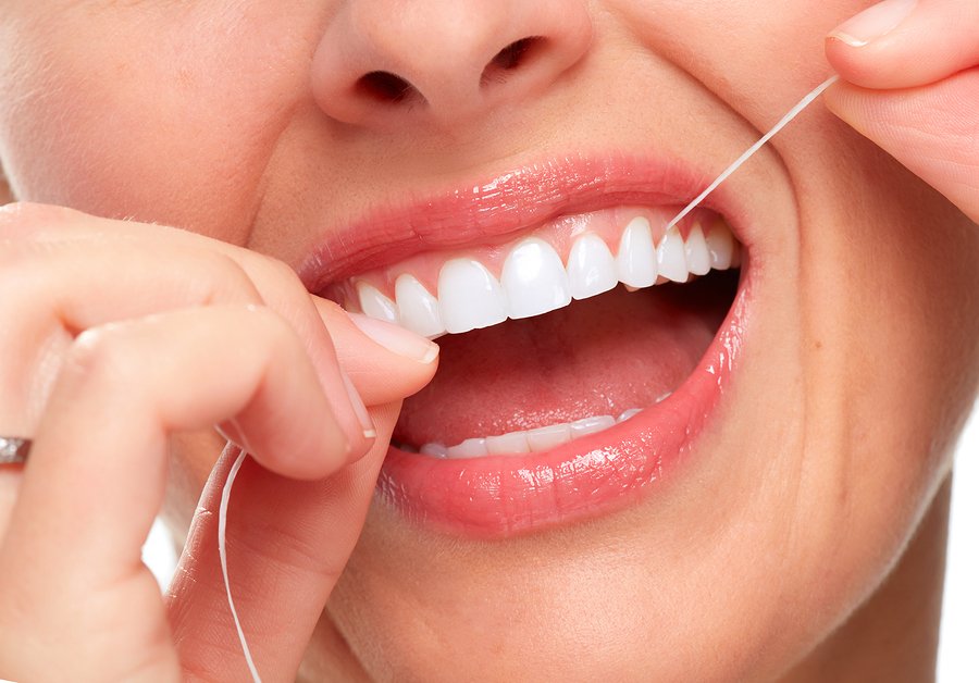 How to Get Floss Out of Teeth